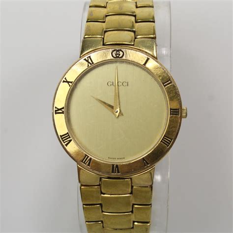 black leather gucci watch and gold gucci watch|Gucci watches original price.